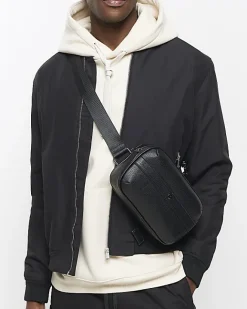 River Island tumbled cross body bag Black Outlet