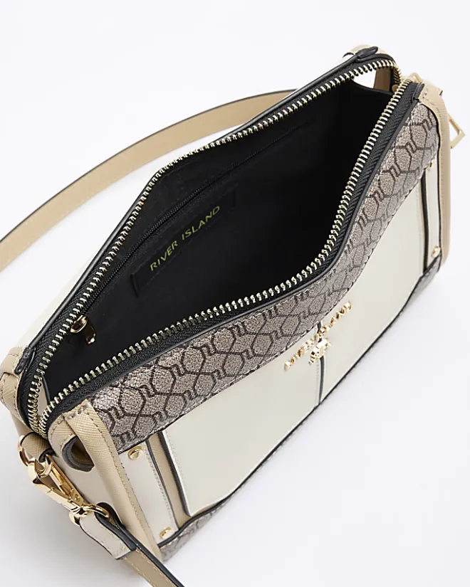 River Island RI monogram panel cross body bag Cream Sale