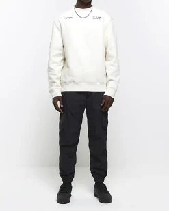 River Island Ecru regular fit graphic patch sweatshirt Stone Online