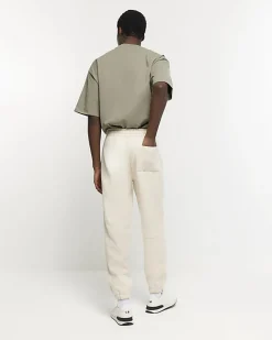 River Island Ecru regular fit rib panel joggers Stone Online