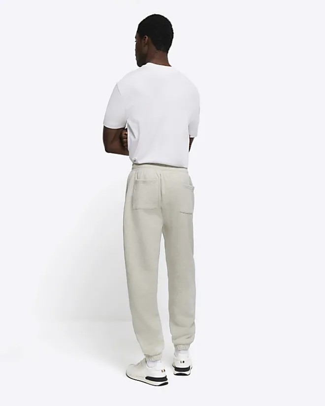 River Island regular fit graphic cuffed joggers Grey Sale