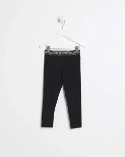 River Island Mini girls heart waistband leggings Black Online