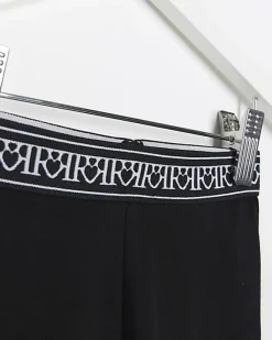 River Island Mini girls heart waistband leggings Black Online