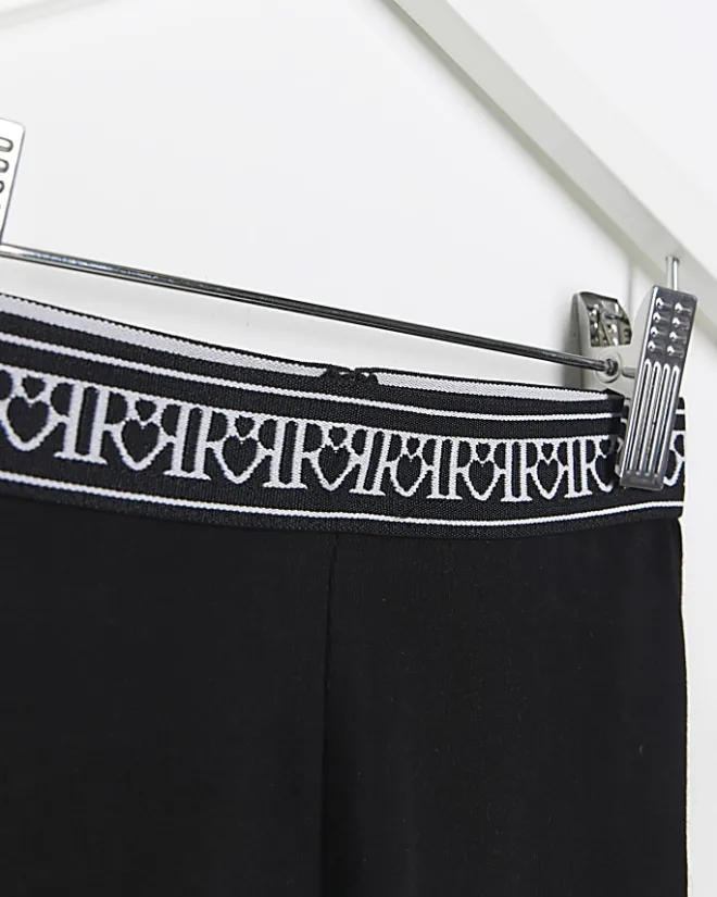 River Island Mini girls heart waistband leggings Black Online