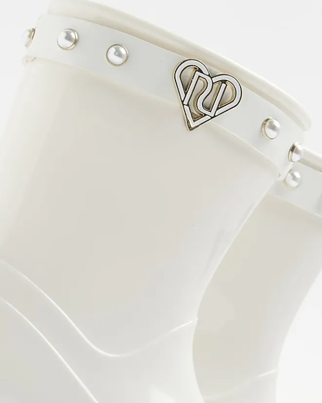 River Island Mini girls RI heart pearl wellie boots Cream Sale