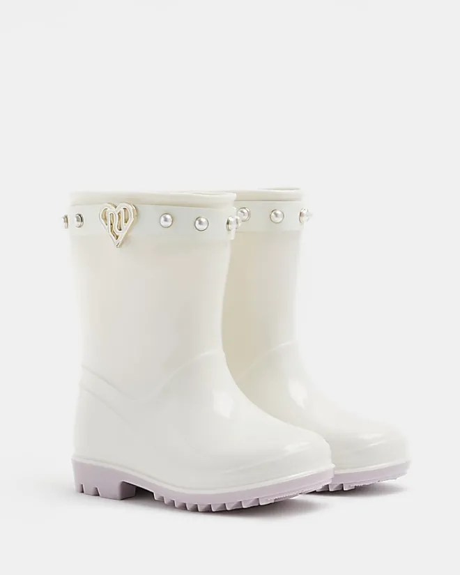 River Island Mini girls RI heart pearl wellie boots Cream Sale