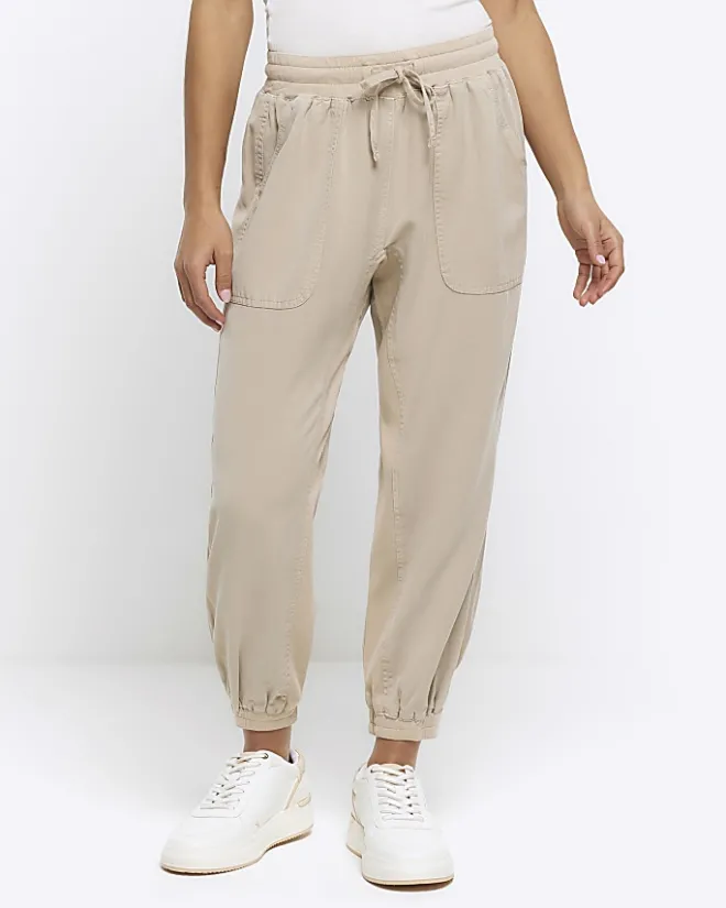 River Island Petite beige lyocell elasticated joggers Cream Fashion