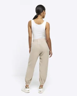 River Island Petite beige lyocell elasticated joggers Cream Fashion