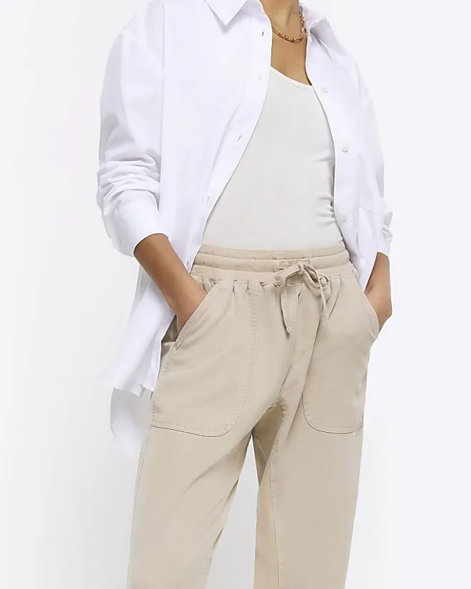 River Island Petite beige lyocell elasticated joggers Cream Fashion