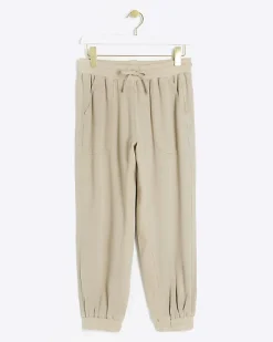River Island Petite beige lyocell elasticated joggers Cream Fashion