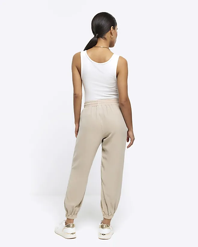 River Island Petite beige lyocell elasticated joggers Cream Fashion