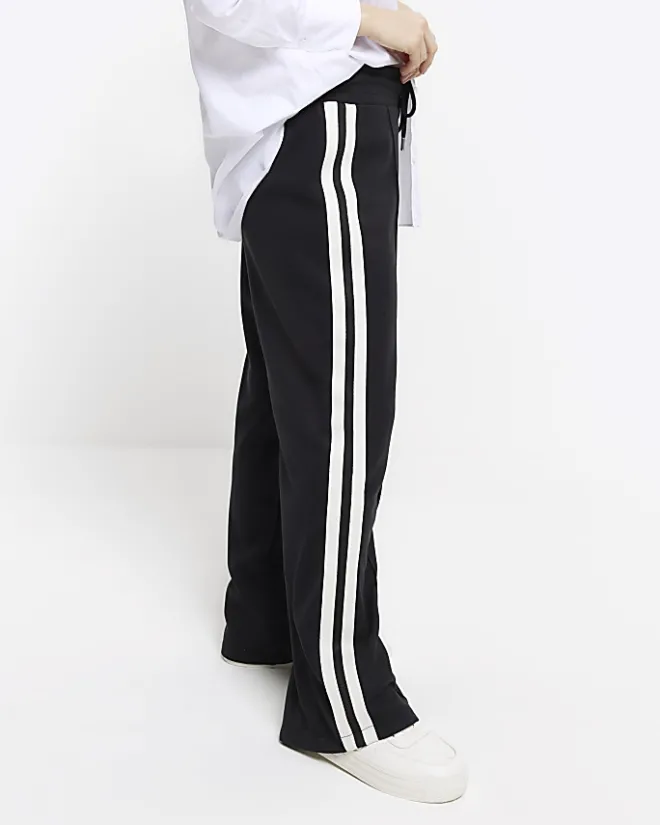 River Island Petite side stripe wide leg joggers Black Fashion