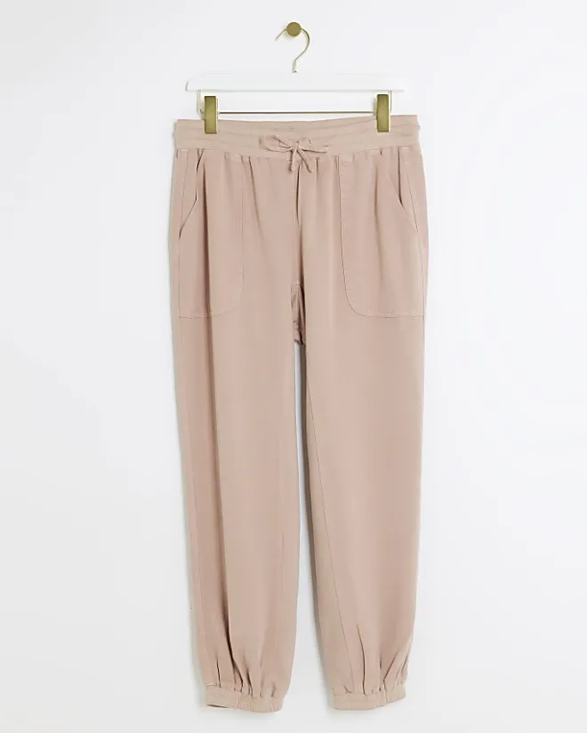River Island lyocell cuffed joggers Pink Sale