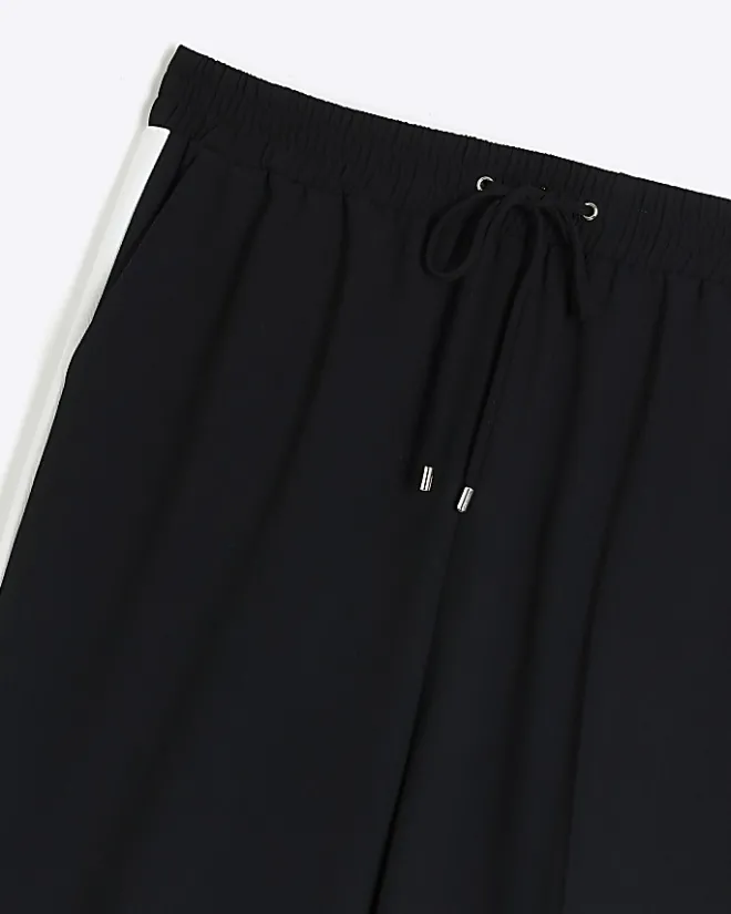 River Island Plus side stripe wide leg joggers Black Outlet